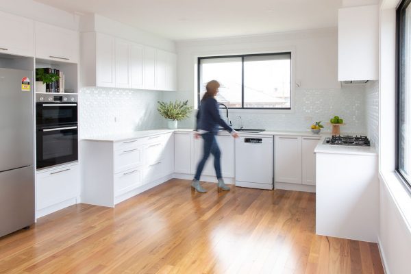 White shaker pantry and oven tower cabinetry